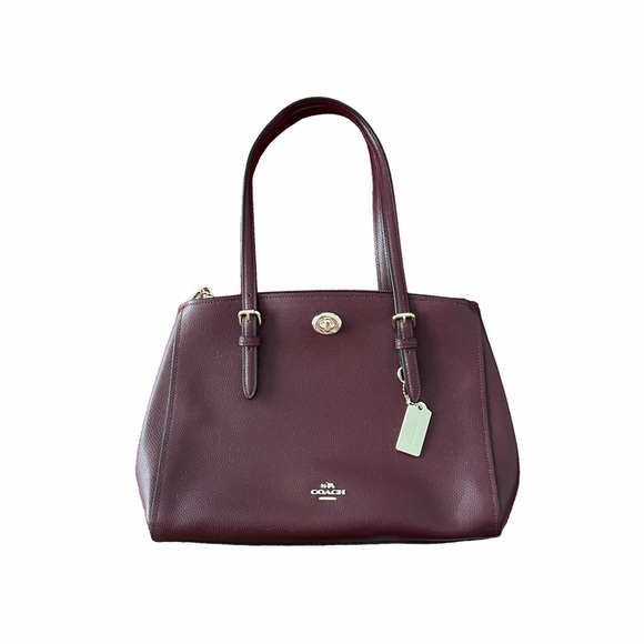 VERY GOOD CONDITION COACH PURSE